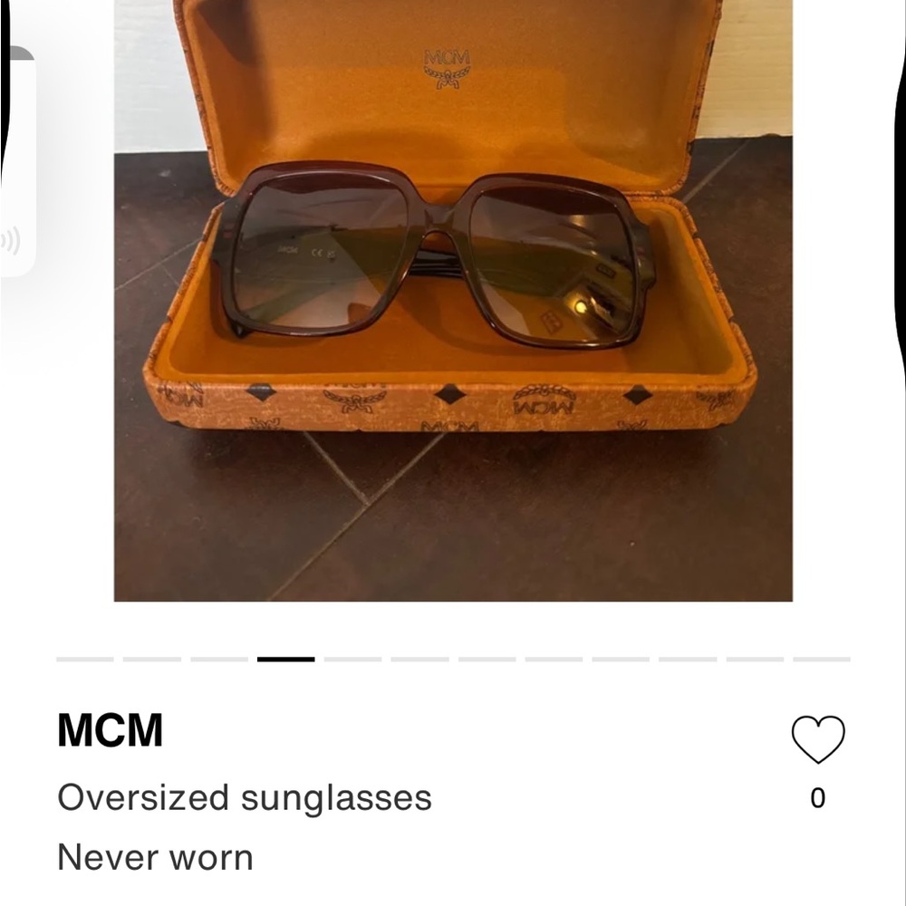New, authentic MCM oversized sunglasses with signature hard shell case.
